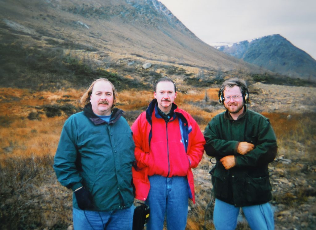 Karl Wells with cameraman Kevin Harvey (L) and Karl's CBC producer, John O'Brien (R) at the Tablelands, Gros Morne National Park (1990s)